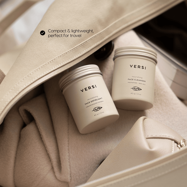 Two Versi skincare jars, a face cleanser and a face exfoliant, nestled inside a beige travel bag. The text 'Compact & lightweight perfect for travel' is overlaid on the top left.